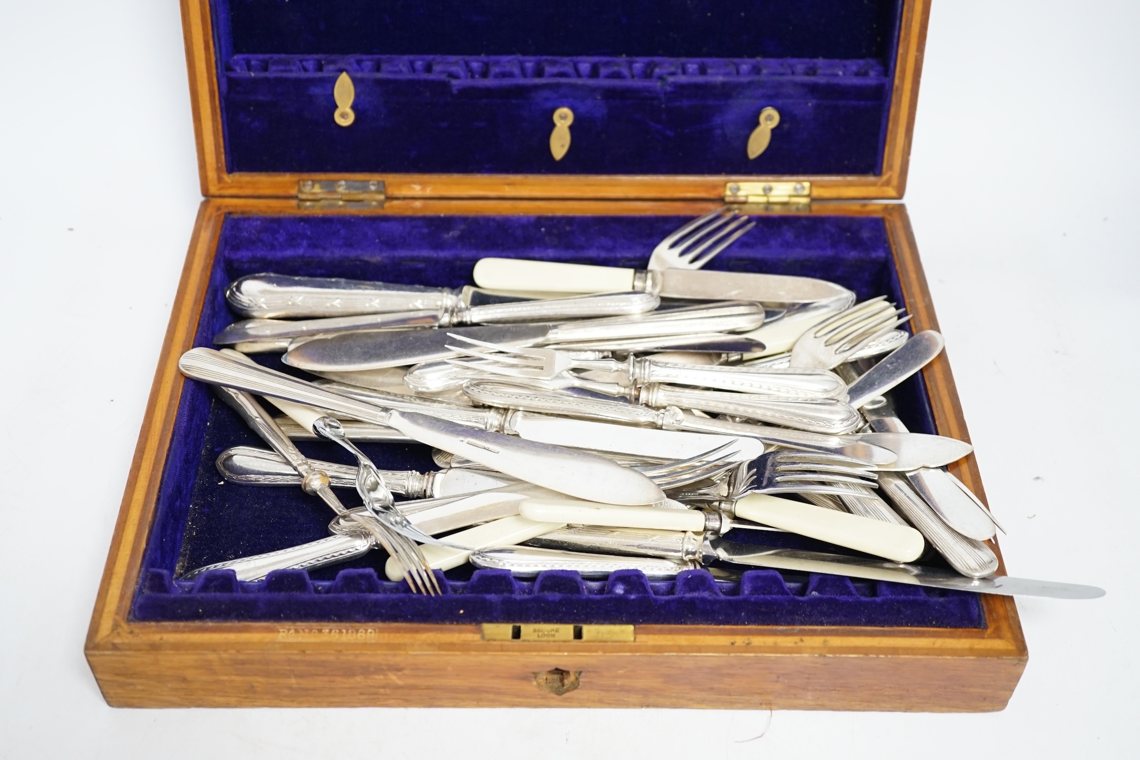 A quantity of silver plate to include cutlery, dishes, a wine coaster, etc. Condition - varies, poor to fair